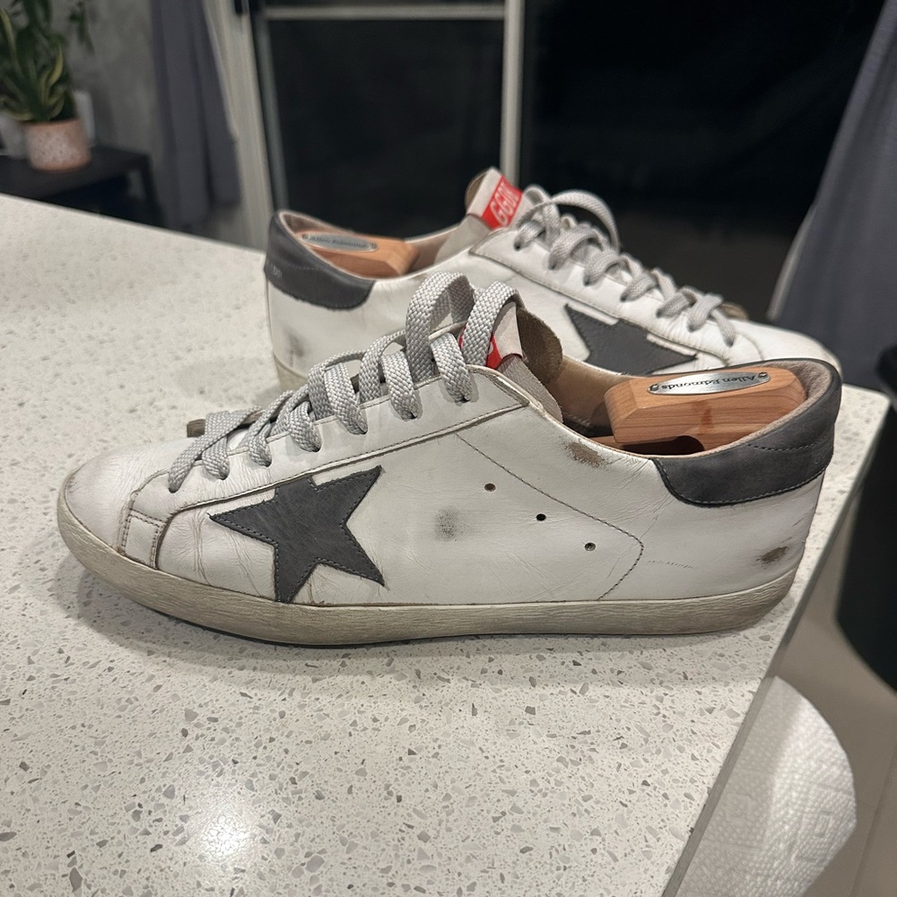 Golden Goose shoes. Grey leather star, grey ankles. Good condition. Size 12 / 45